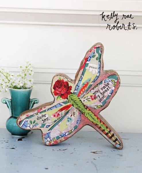 http://gardengalleryironworks.com/collections/decorative-decor/products/wood-sculpture-dear-joy-dragonfly