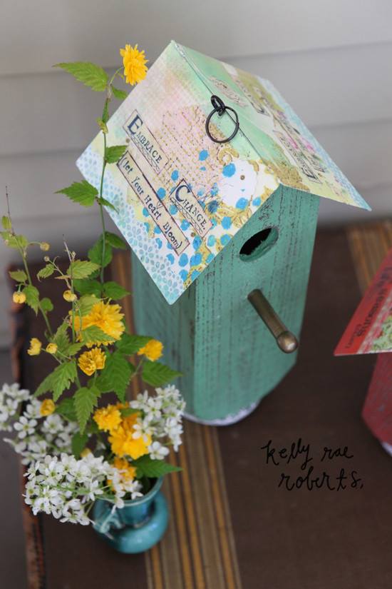 http://gardengalleryironworks.com/collections/kelly-rae-roberts-dream-garden/products/wood-birdhouse-embrace-change